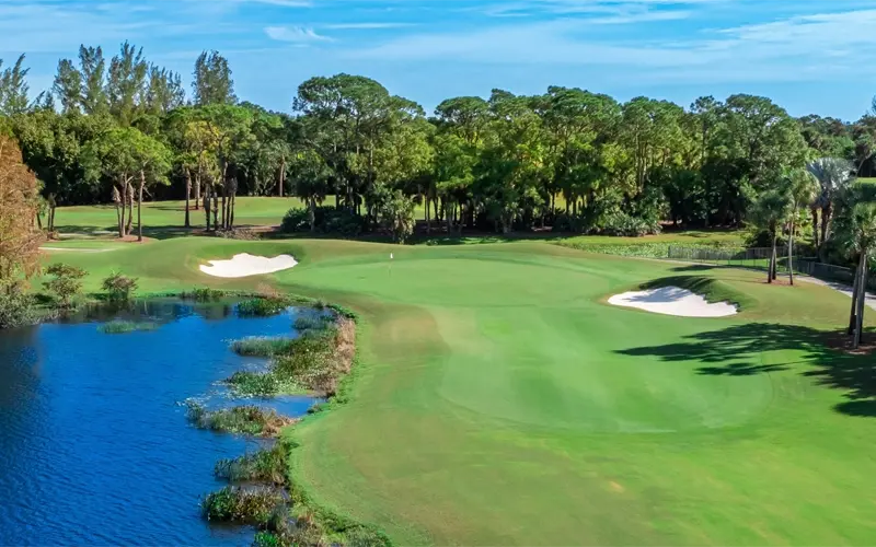 aerial view of the preserve at iron horse golf course with water on the left and bunkers on the right
